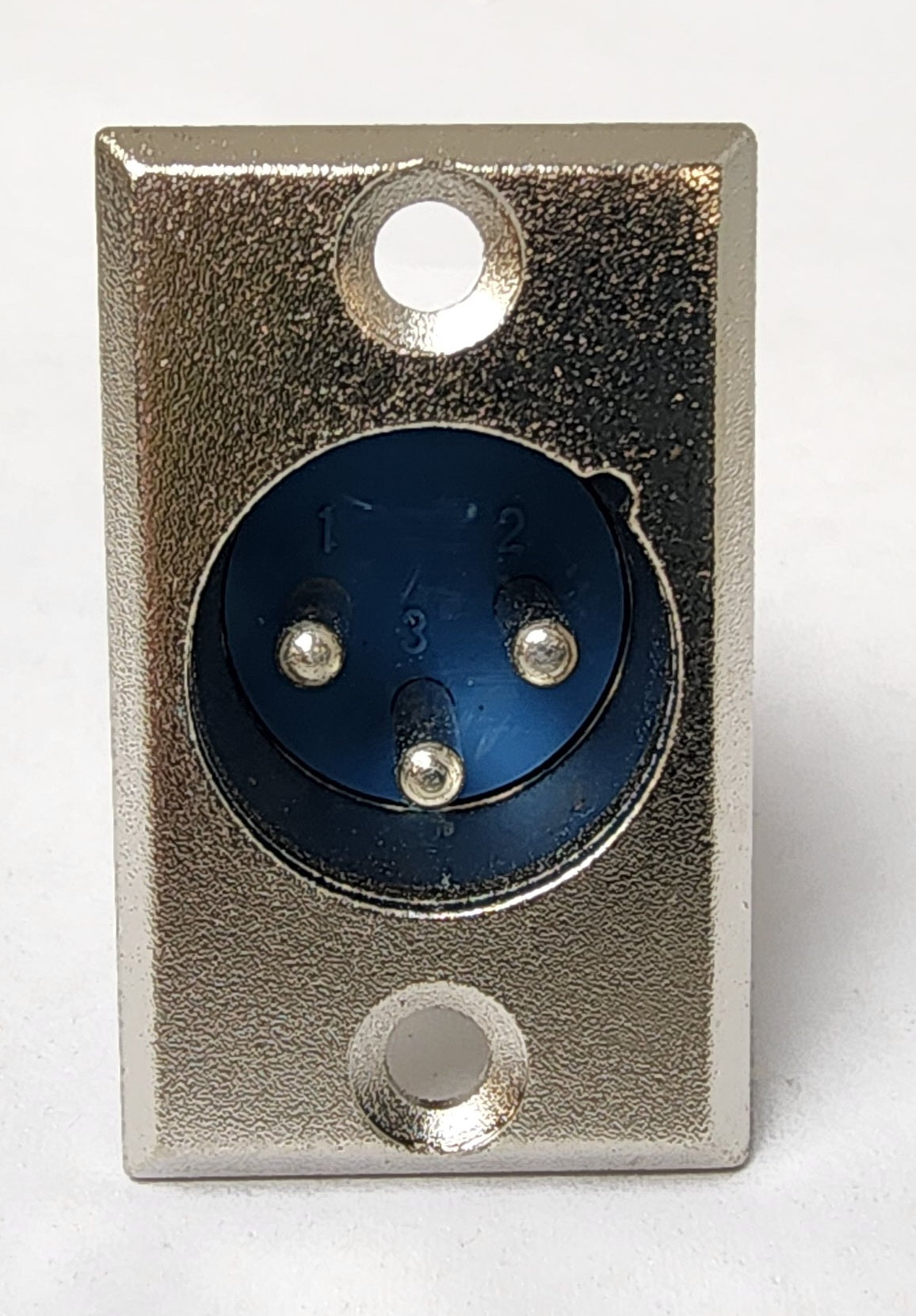 This image features a close-up of the Sherpa Winch Plug Socket by Scintex Australia. The metallic three-pin electrical connector is positioned vertically against a plain background. It is perfect for Sherpa 4x4 applications, showcasing its numbered blue interior pins. The connector, designed for control box replacement, sits on a rectangular plate equipped with two screw holes.