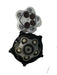 A Scintex Water Pump Diaphragm Kit that includes a circular assembly composed of multiple parts, with a central gear-like structure and several sections in white and dark brown arranged in a star pattern.